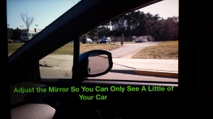 You should only see a little bit of the car with your side view mirror adjust properly